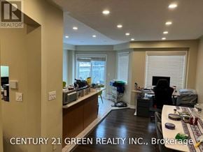 Milton (De Dempsey) apartment for rent - A realtor's office with a desk and a computer.