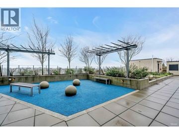 Vancouver apartment for rent - A pool with a bench and a ball in the middle of it.
