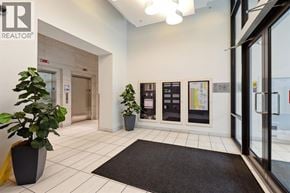 Vancouver apartment for rent - A hallway with a sign that says REALTOR.