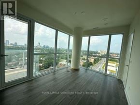 Toronto (Parkwoods-Donalda) condo for rent - A room with a view of the city through large windows.