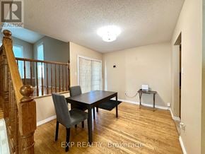 Ottawa apartment for rent - A dining room with a wooden table and chairs.