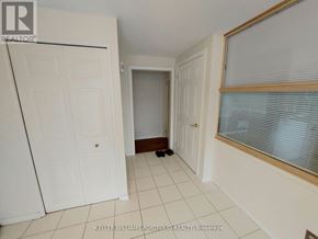 Markham (Royal Orchard) apartment for rent - A white room with a door and a window.