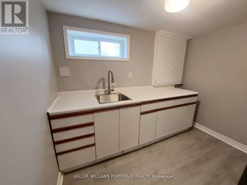Markham (Royal Orchard) apartment for rent - A kitchen with a sink and a window.