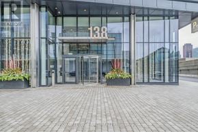 Toronto (Waterfront Communities) condo for rent - The front of a building with the number 138 on it.