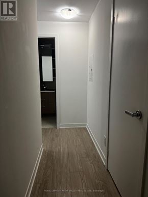 Toronto (High Park North) condo for rent - A hallway with a door on the right and a door on the left.