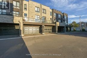 Vaughan (Vellore Village) townhouse for rent - A building with the text HOMELIFE/MIRACLE REALTY LTD, Brokerage on the bottom.