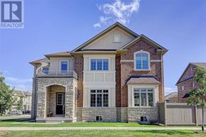 Oakville (Jm Joshua Meadows) apartment for rent - A house with a stone facade and a large front porch.