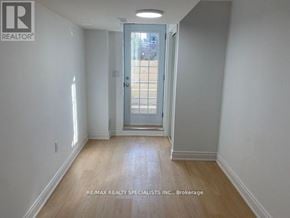 Mississauga (East Credit) apartment for rent - A hallway with a door leading to a balcony.