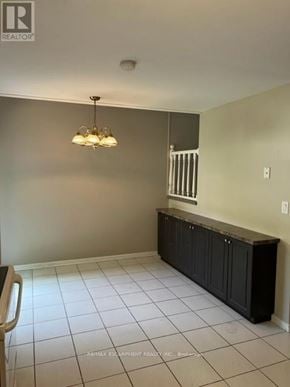 Burlington (Roseland) townhouse for rent - A room with a chandelier, a cabinet, and a window with blinds.