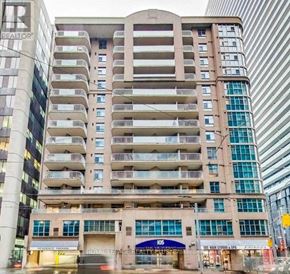 Toronto (Church-Yonge Corridor) condo for rent - A large building with a sign that says "Royal LePage" on it.
