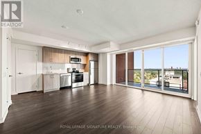 Toronto (Humber Heights) condo for rent - A spacious kitchen and living room with wooden floors and a view of the city.