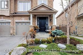 Vaughan (Vellore Village) townhouse for rent - A house with a black front door and a sign that says Century 21 Parkland Ltd., Brokerage.