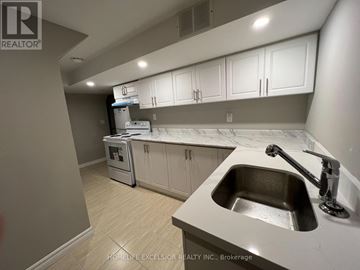 Toronto (Agincourt South-Malvern West) apartment for rent - A kitchen with a sink, cabinets, and a dishwasher.