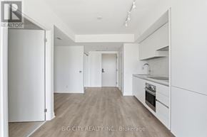 Toronto (Thorncliffe Park) condo for rent - A real estate image of a kitchen and hallway.