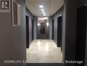 Toronto (Bendale) condo for rent - A hallway with the logo of REALTOR on the wall.