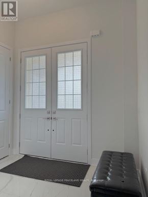 Aurora apartment for rent - A white double door with a glass panel is closed.