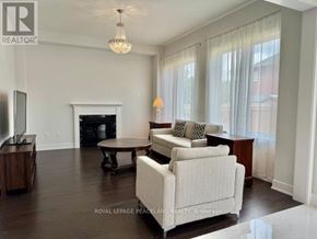 Aurora apartment for rent - A living room with a fireplace and a couch.
