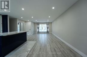 Toronto (Victoria Village) apartment for rent - A spacious room with wooden flooring and a large window with curtains.