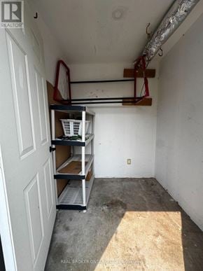 Barrie (Letitia Heights) apartment for rent - A white door with a shelving unit next to it.