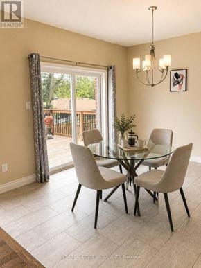 London North (North H) apartment for rent - A dining room with a glass table and chairs.