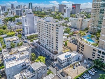 San Juan apartment for rent - A cityscape with a mix of residential and commercial buildings.