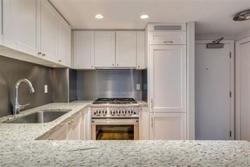 Vancouver apartment for rent - A kitchen with a stove and sink.