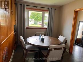 Oshawa (Donevan) apartment for rent - A dining room with a round table and chairs.