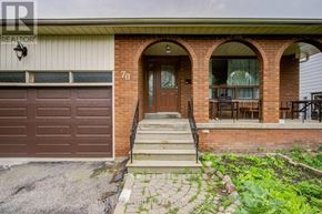 Richmond Hill (Mill Pond) apartment for rent - A house with a brown door and a brick wall.