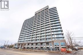 Hamilton (Riverdale) condo for rent - A tall building with the letters "TR" on the top.