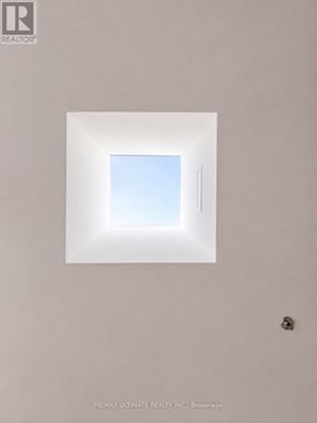 Toronto (South Riverdale) condo for rent - A white square window in a wall.
