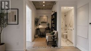 Toronto (Moss Park) condo for rent - A room with a chair and a table in it.