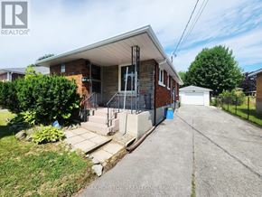 Cornwall apartment for rent - A house with a realtor logo in the corner.