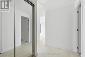 Toronto (Thorncliffe Park) condo for rent - A white room with a doorway leading to another room.