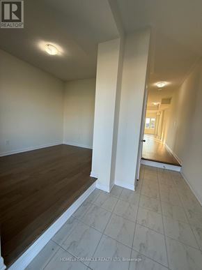 Loyalist (Bath) apartment for rent - A room with white walls and a wooden floor.