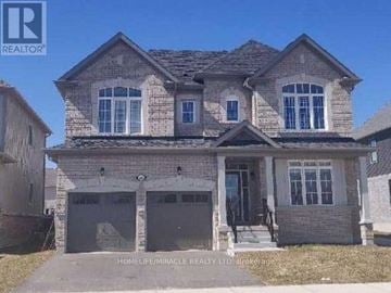 Collingwood apartment for rent - A two-story house with a garage is for sale.