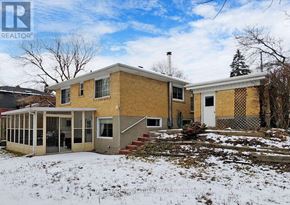 Toronto (Rouge) apartment for rent - A house with a yellow brick exterior is for sale.