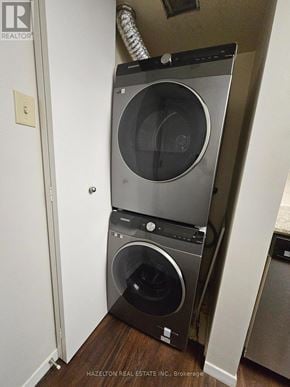 Toronto (Bay Street Corridor) condo for rent - A stack of two front loading washing machines in a small laundry room.