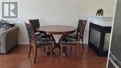 Mississauga (Hurontario) apartment for rent - A dining room with a table and chairs.