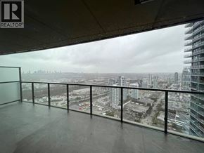 Burnaby apartment for rent - A view from a high-rise building looking out over a cityscape.