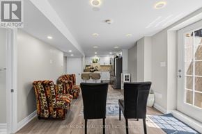 Milton (Cl Clarke) apartment for rent - A real estate office with a desk and chairs.