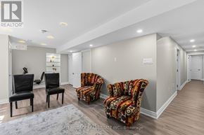 Milton (Cl Clarke) apartment for rent - A living room with two chairs and a couch.