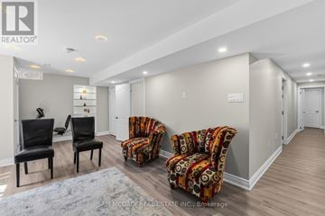 Milton (Cl Clarke) apartment for rent - A living room with two chairs and a couch.