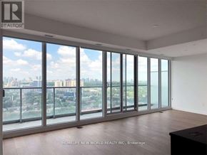 Toronto (Bayview Village) condo for rent - A room with a view of the city through large windows.