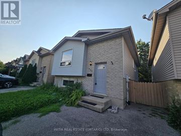 London North (North I) apartment for rent - A house with a grey front and a white door is for sale in Brokerage.