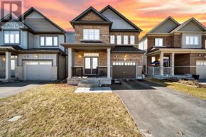 Centre Wellington (Fergus) apartment for rent - A row of houses with a sunset in the background.