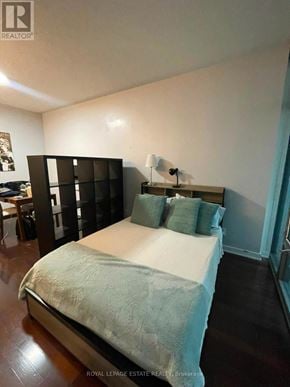 Toronto (Church-Yonge Corridor) condo for rent - A bedroom with a bed, nightstand, and lamp.