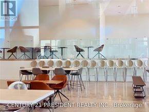 Toronto (University) condo for rent - A conference room with chairs and tables arranged for a meeting.