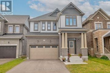 New Tecumseth apartment for rent - A large, two-story house with a garage is for sale in Brokerage by Coldwell Banker Ronan Realty.