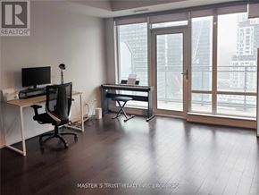 Toronto (Waterfront Communities) condo for rent - A room with a desk and a chair in it.