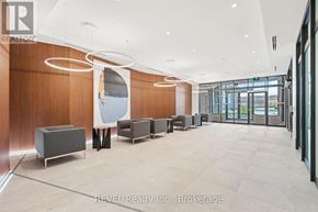 Grimsby (Grimsby Beach) condo for rent - A modern office lobby with a reception desk and seating area.